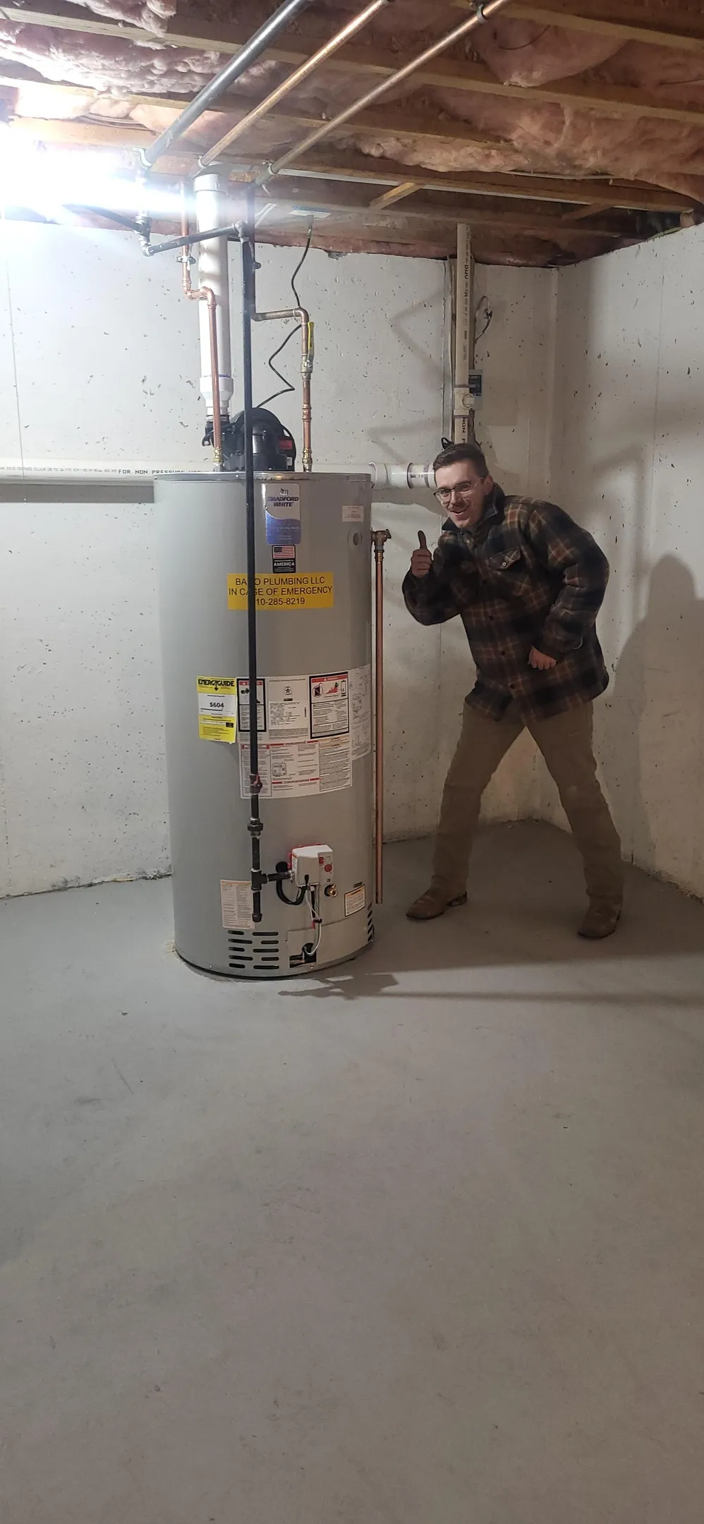 Andrew next to water heater